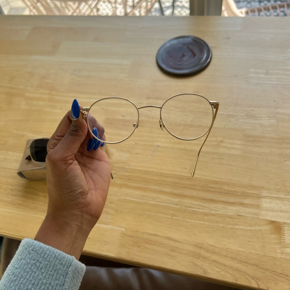 Calvin Klein Wire Rimmed Glasses in Gold